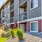 landscaping and open grassy areas outside of patios and apartment homes